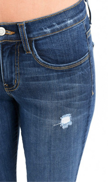 Medium Wash Lightly Distressed Mid-Rise Skinny Jean